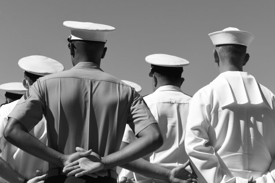 US Navy sailors from the back.