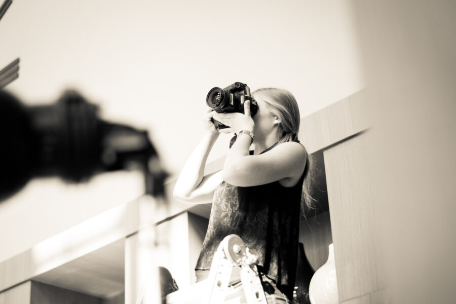 Woman taking photographs